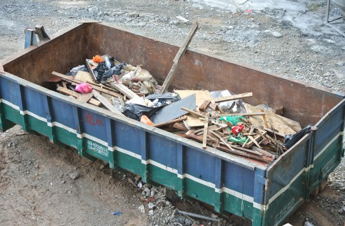Crew setting up a recycling zone during a flat clearance in Penge